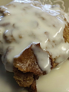 A picture of Bread Pudding with Whiskey Sauce.
