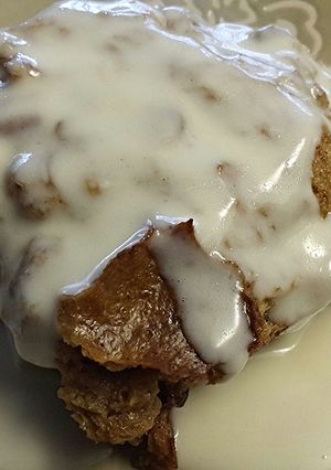 A picture of Bread Pudding with Whiskey Sauce.