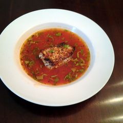 A picture of Fish Fillets in Spicy Tomato Broth.