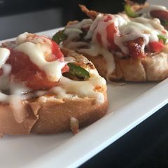 A picture of Broiled tomato bruschetta.