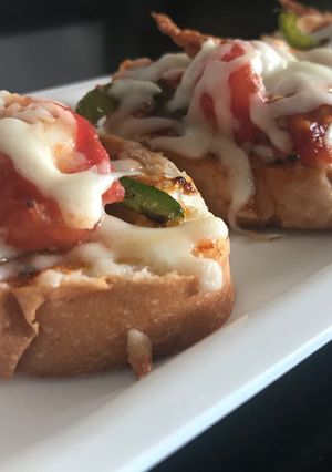 A picture of Broiled tomato bruschetta.
