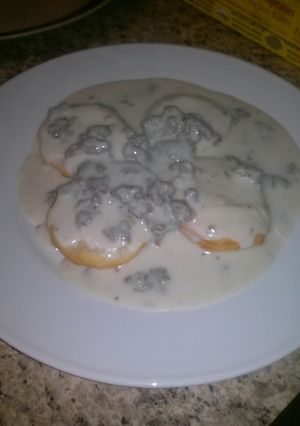 A picture of Sausage biscuit with gravy.