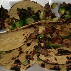 A picture of Tacos de Brussels los Caliente.