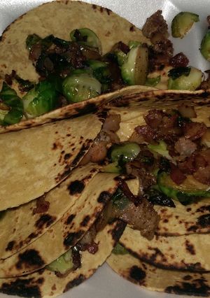 A picture of Tacos de Brussels los Caliente.