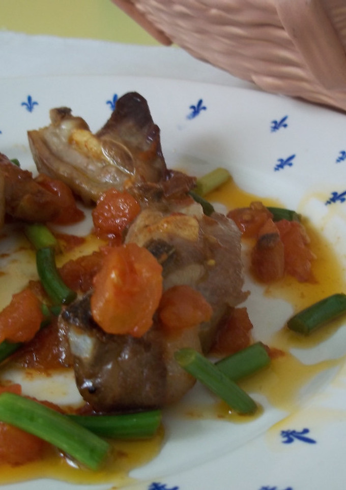 Una foto de Costillas de cordero con ajos