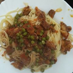 A picture of Beef stew with spaghetti.