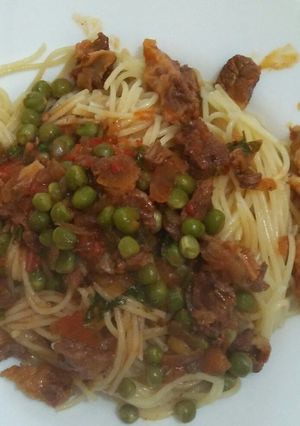 A picture of Beef stew with spaghetti.