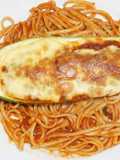 Zapallitos italianos rellenos con salsa boloñesa