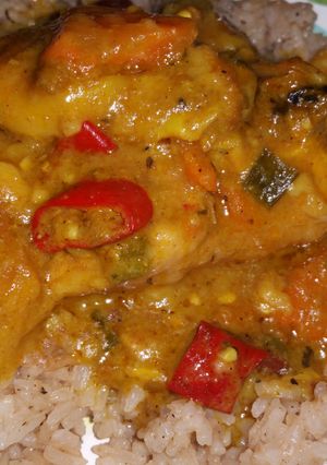 A picture of Slow cooker curry chicken and easy rice and peas.