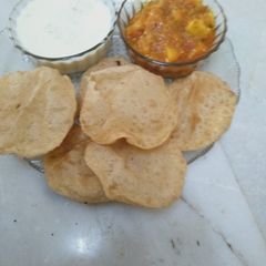A picture of Dudhpak with Puri sabji.