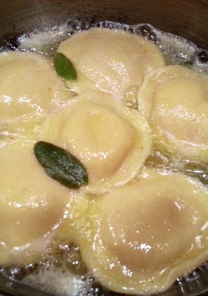 A picture of Thanksgiving Pumpkin Raviolis w/Sage Butter Sauce & Pumpkin Spice Martini.