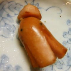 A picture of Mr. Octopus Wiener Sausage with a Hat.