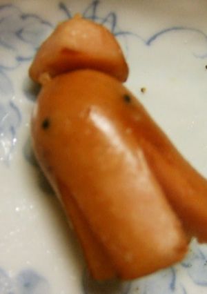 A picture of Mr. Octopus Wiener Sausage with a Hat.