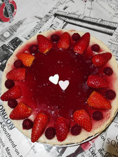 Una foto de Tarta de queso con frutos rojos
