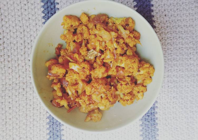 Steps to Make Any-night-of-the-week Cauliflower Poriyal / Gobi masala: