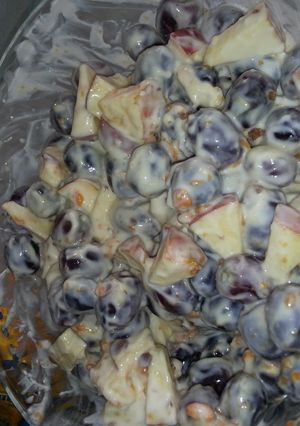 A picture of Grapes and apples salad.