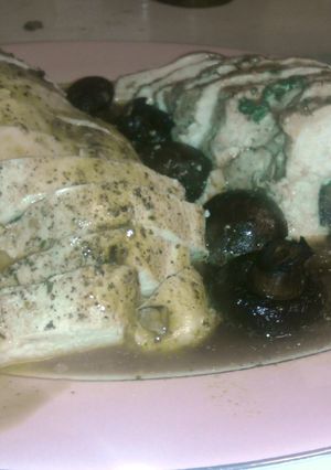 A picture of Mushroom spinach stuffed chicken.