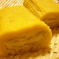 A picture of Sushi Restaurant Tamagoyaki (Rolled Omelette).