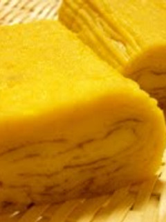 A picture of Sushi Restaurant Tamagoyaki (Rolled Omelette).