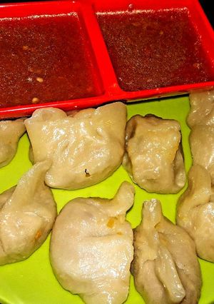 A picture of Mix Veg Stuffed Momos With Chutputey Tomato Chutney.