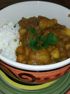 A picture of Potato Chick-Pea Curry W/Garlic Roasted Cauliflower - Serve W/Basmati Rice & Cha.