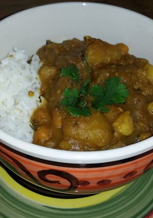 A picture of Potato Chick-Pea Curry W/Garlic Roasted Cauliflower - Serve W/Basmati Rice & Cha.