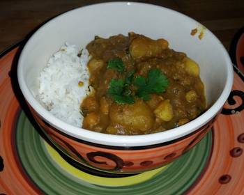 Update, Cooking Recipe Potato ChickPea Curry WGarlic Roasted Cauliflower  Serve WBasmati Rice  Cha Delicious