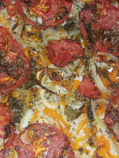 Una foto de Filet de Merluza con verduras al horno