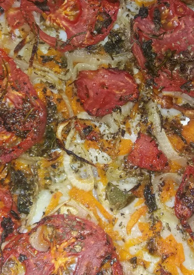 Una foto de Filet de Merluza con verduras al horno