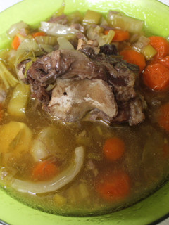 Una foto de Rabo de toro con preparado de verduras