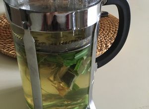 Una foto de Te de jengibre-yerba mate cocido-cúrcuma-limoncillo