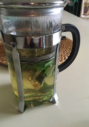 Una foto de Te de jengibre-yerba mate cocido-cúrcuma-limoncillo