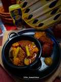 Macher Dimer Borar Tok Jhol (Fish Roe Fritters in Tangy Curry)