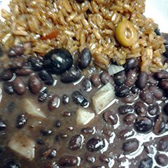 A picture of Olive rice and malta with black beans.
