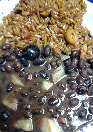 A picture of Olive rice and malta with black beans.