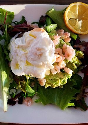 A picture of Poached Egg on Guacamole with Shrimp.