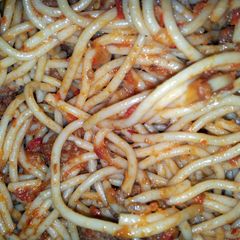 A picture of spaghetti and cheese.