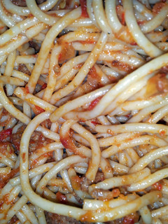 A picture of spaghetti and cheese.