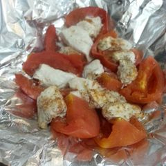 A picture of HCG Diet meal 12: Tomatoes and Chicken.