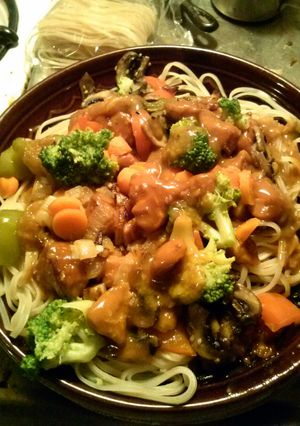 A picture of Mae's Orange Sesame Chicken with Veggie Stir Fry.