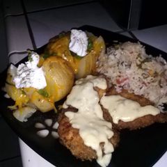A picture of Cajun Fried Chicken with yummy sides:).