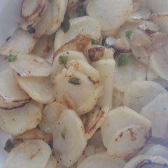 A picture of Fried Potatos with Jalapeño and Onion.