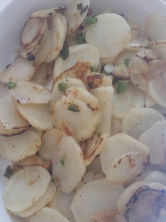 A picture of Fried Potatos with Jalapeño and Onion.