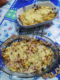 Una foto de Patatas gratinadas con queso y bacon
