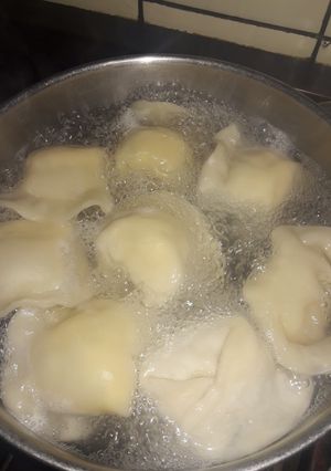 Una foto de Capelettis con masa de empanadas