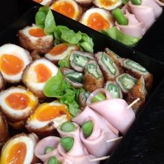 A picture of Creamy Meat-Wrapped Soft-Boiled Eggs.