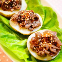 A picture of Potatoes Topped With Beef.