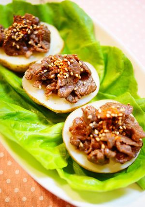 A picture of Potatoes Topped With Beef.
