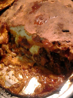 A picture of skunks pizza pie.