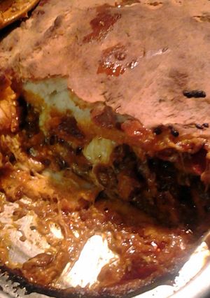 A picture of skunks pizza pie.